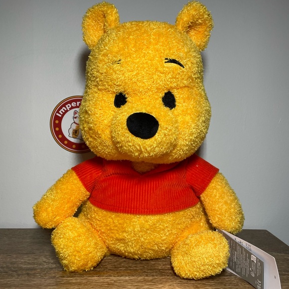 Disney Parks Weighted Winnie the Pooh Plush